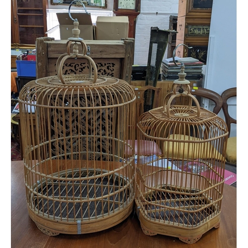 486 - Two Chinese bamboo wood domed top hanging bird cages, the largest 72cm h
Location:A2F
If there is no... 