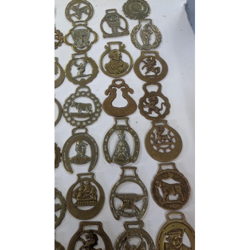 538 - A large quantity of horse brass to include a masonic example and others
Location:4.5
If there is no ... 