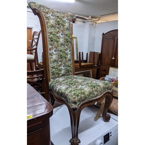 465 - A Victorian mahogany and tapestry upholstered prie du chair on cabriole front legs and scrolled feet... 