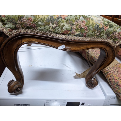 465 - A Victorian mahogany and tapestry upholstered prie du chair on cabriole front legs and scrolled feet... 