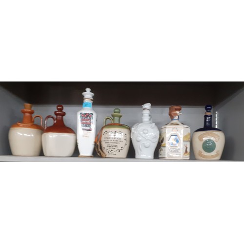 550 - Whiskey related items to include empty decanters and advertising tumblers and other items. 
Location... 