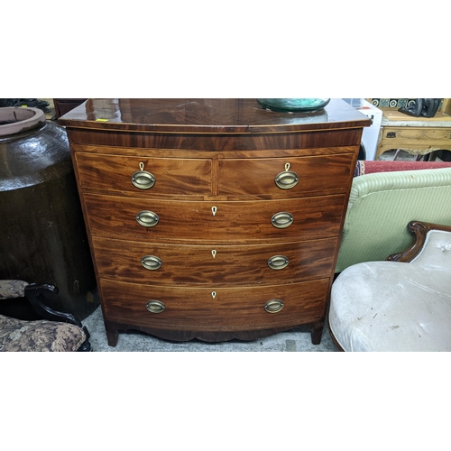 473 - Victorian mahogany bow fronted chest, two short over three long graduated drawers, brass handles bra... 