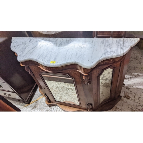 524 - A Victorian marble topped side washstand, serpentine fronted with central inlaid and mirrored cupboa... 