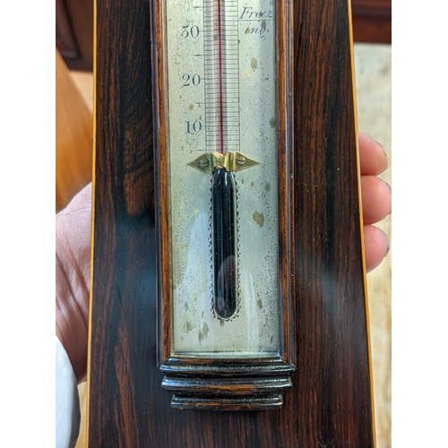 291 - A Regency rosewood barometer, face marked A Abraham & Co Liverpool, with swan neck pediment and baro... 