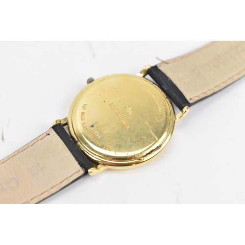 100 - A Raymond Weil, quartz, gents, 18ct gold plated wristwatch, the two tone dial having Roman numerals ... 