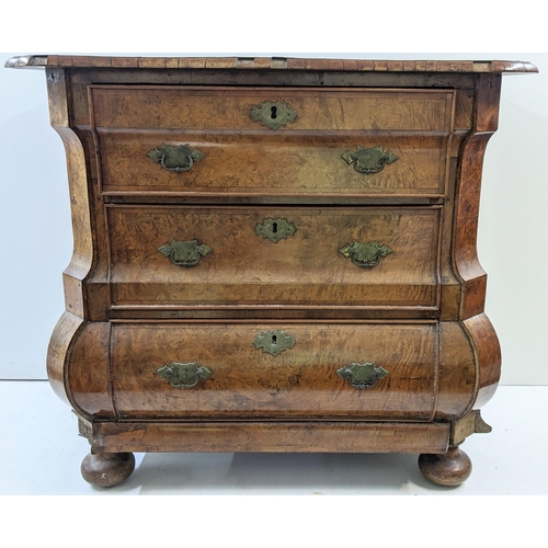 168 - A 18th century continental burr walnut bombe chest of three graduating drawers, having marquetry inl... 