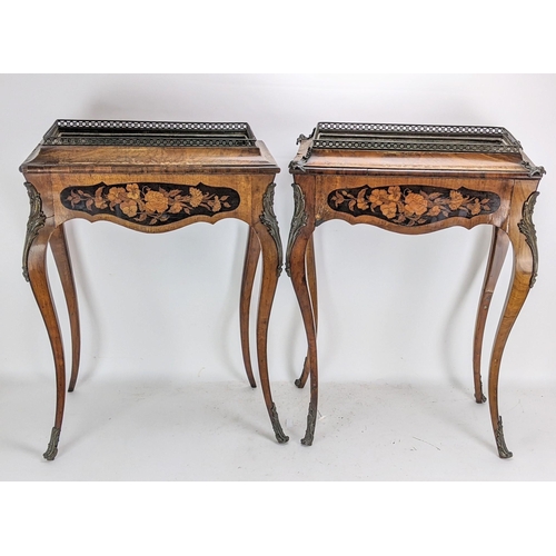 170 - A pair of 19th century French kingwood jardiniere tables, each having a pierced gallery top with a m... 