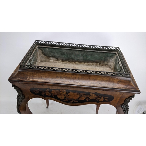 170 - A pair of 19th century French kingwood jardiniere tables, each having a pierced gallery top with a m... 