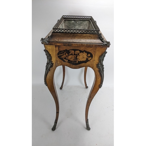 170 - A pair of 19th century French kingwood jardiniere tables, each having a pierced gallery top with a m... 