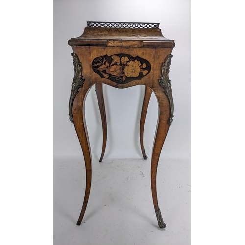 170 - A pair of 19th century French kingwood jardiniere tables, each having a pierced gallery top with a m... 