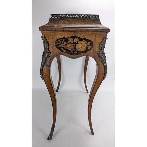 170 - A pair of 19th century French kingwood jardiniere tables, each having a pierced gallery top with a m... 