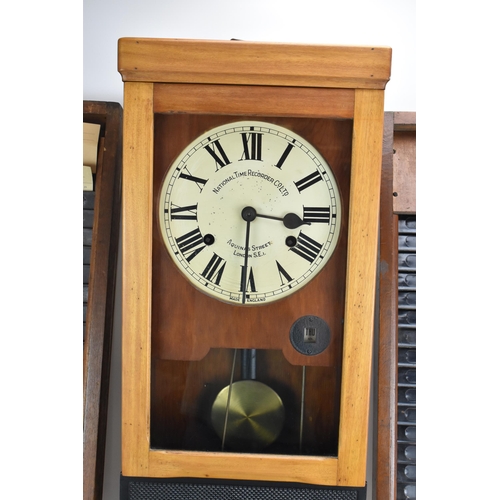 90A - An early/mid 20th century National Time Recorder clocking in clock, in a stained beech case, the cir... 