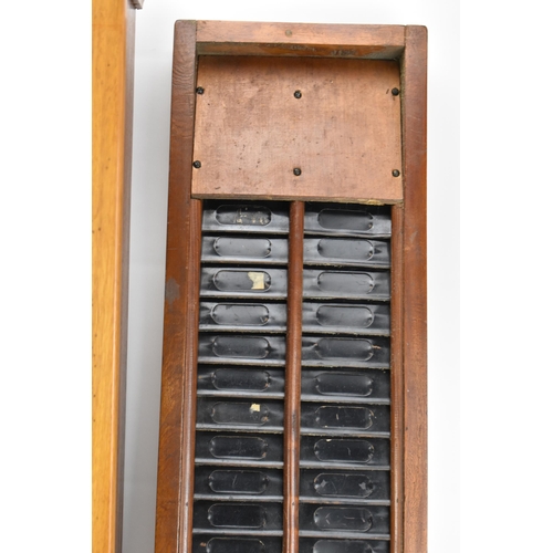 90A - An early/mid 20th century National Time Recorder clocking in clock, in a stained beech case, the cir... 