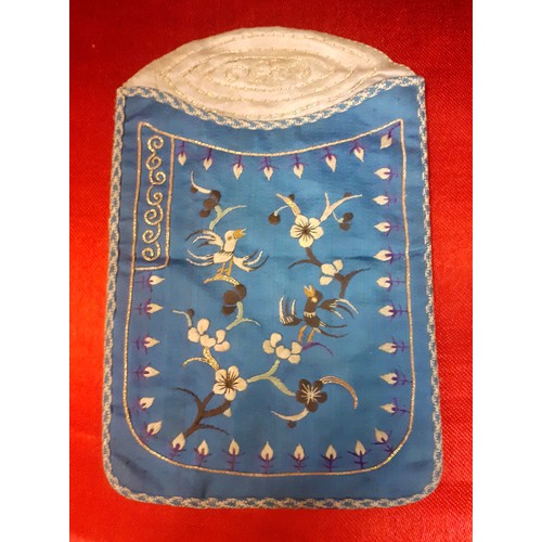 36 - A small group of early 20th Century Chinese embroidered panels and clothing accessories comprising a... 