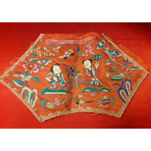 36 - A small group of early 20th Century Chinese embroidered panels and clothing accessories comprising a... 