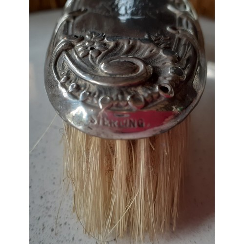 58 - Three silver backed clothes brushes to include a pair of mid 20th Century Adie Brothers Ltd brushes.... 