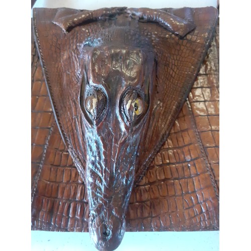 62 - A mid 20th Century brown crocodile skin bag with baby crocodile head and feet to the flap. Location:... 