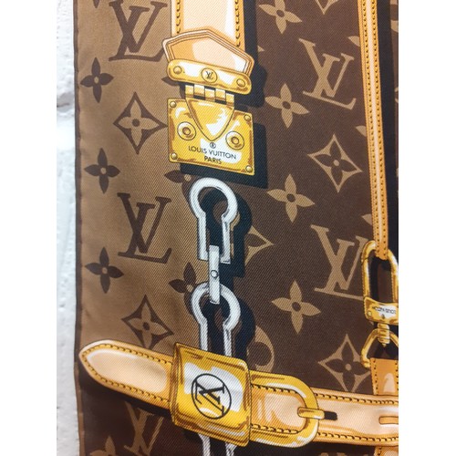 2 - Louis Vuitton- A brown LV monogram silk scarf with belt and chain design having hand rolled edges to... 