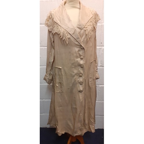 35 - An early 20th Century ladies beige silk lightweight coat with cream Guipure lace collar, Location:Ra... 