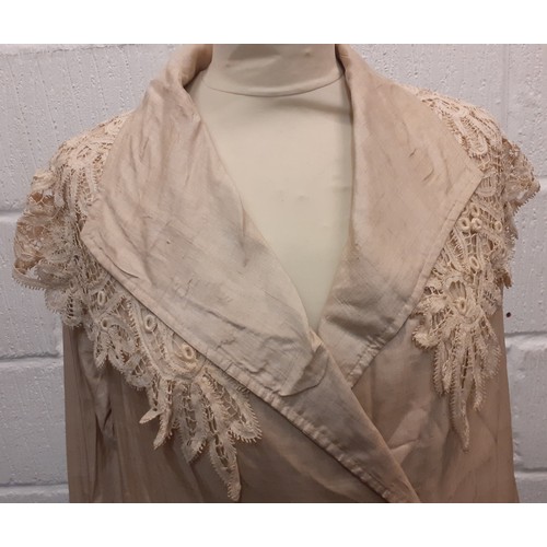 35 - An early 20th Century ladies beige silk lightweight coat with cream Guipure lace collar, Location:Ra... 