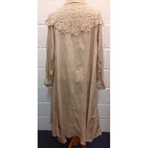 35 - An early 20th Century ladies beige silk lightweight coat with cream Guipure lace collar, Location:Ra... 