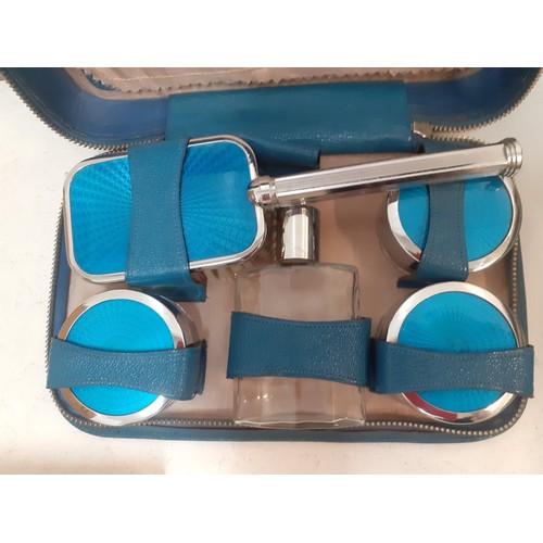 66 - A mid 20th Century chrome and blue enamelled vanity set in blue travel case with 'Made in England' i... 