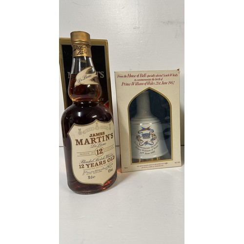 105 - A single bottle of James Martin Blended Scotch Whisky, 12 year old, and a Bells celebration flask Pr... 