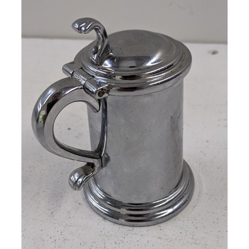 104 - A Dunhill cigarette lighter in the shape of a tankard Location:CAB6
If there is no condition report ... 