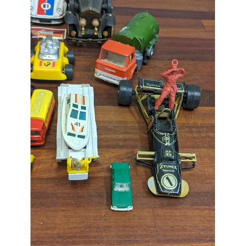 108 - A mixed lot of toys to include a Kingsman Robot Machine, a Corgi Ford Mustang and a Matchbox superki... 