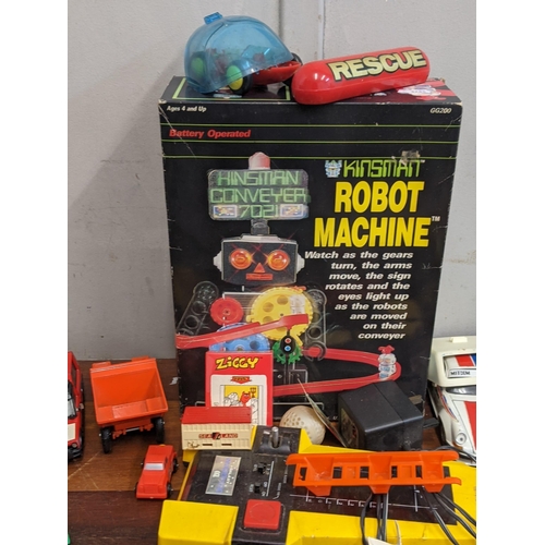 108 - A mixed lot of toys to include a Kingsman Robot Machine, a Corgi Ford Mustang and a Matchbox superki... 