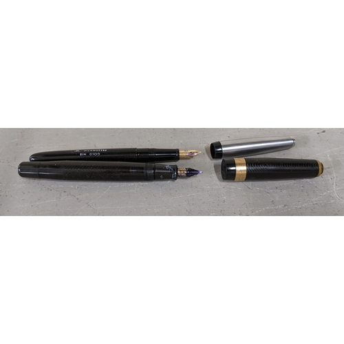 11 - Four pens to include a boxed 14ct gold plated Shaefer fountain and ball point pen set together with ... 