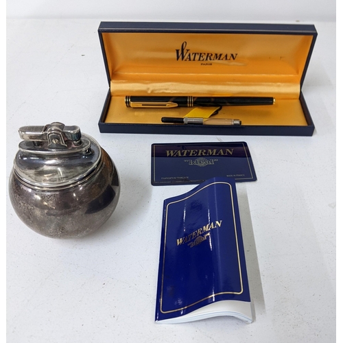 13 - A silver Witchball lighter, hallmarked London 1956 and a Waterman 'Ideal' fountain pen with an 18ct ... 