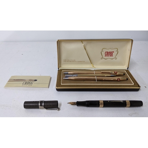 14 - A 14ct gold plated cross propelling pencil, spare pencil and pen casement set (without pen insert), ... 