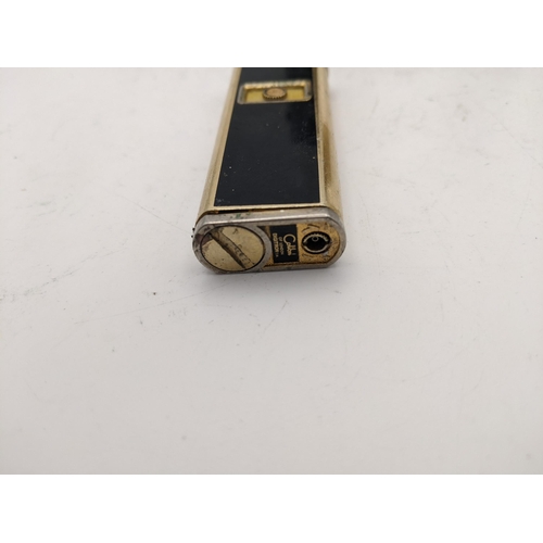 21 - Three vintage cigarette lighters to include a Dunhill, A Colibri and a Ronson 
Location:CAB2
If ther... 