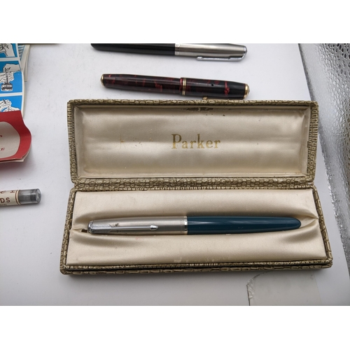 22 - Boxed Parker pens to include a blue Parker S1 fountain pen and propelling pencil set with paperwork ... 