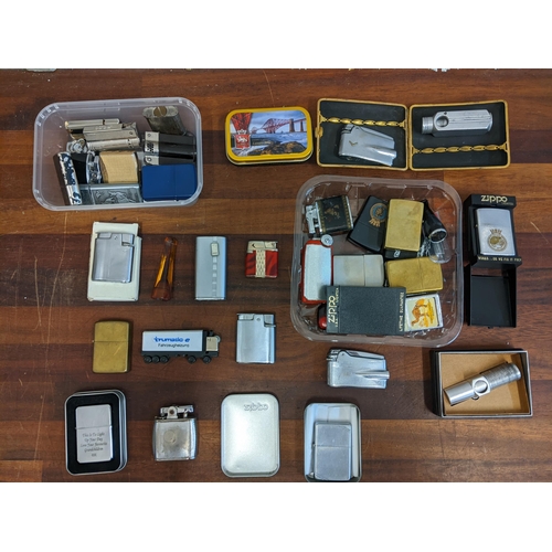 27 - A collection of cigarette lighters and smoking equipment to include various Zippos, Ronson Colibries... 