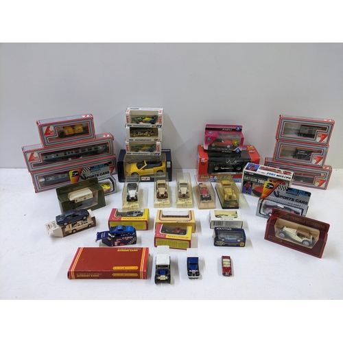 31 - A collection of die cast vehicles to include Delage Coupe's from The Solid Age D'or range, boxed mat... 