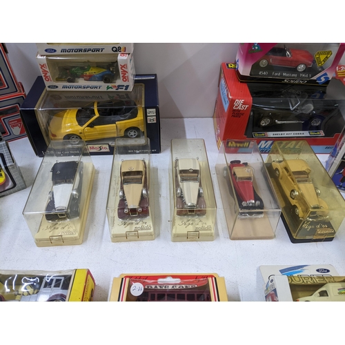 31 - A collection of die cast vehicles to include Delage Coupe's from The Solid Age D'or range, boxed mat... 