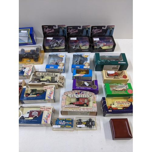 32 - A collection of die cast model vehicles and aircraft to include a boxed Corgi, Concorde, a Polistick... 