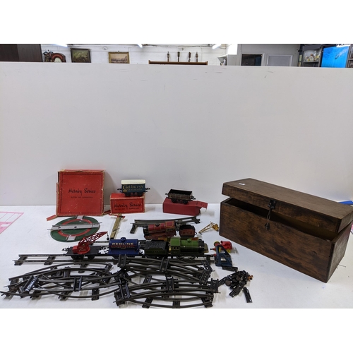 34 - A collection of tin plated early 0 gauge Hornby series model railway accessories to include a boxed ... 