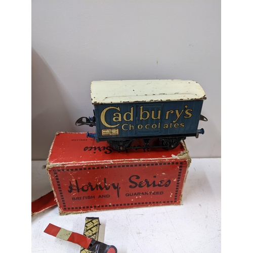 34 - A collection of tin plated early 0 gauge Hornby series model railway accessories to include a boxed ... 