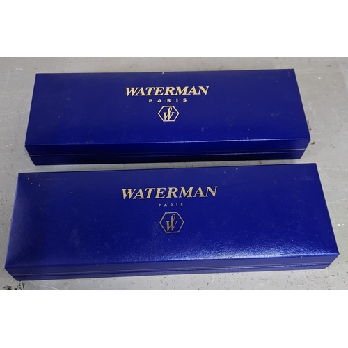 4 - Two Waterman Phiceas red pens and their original cases, to include a ballpoint pen, a fountain pen a... 