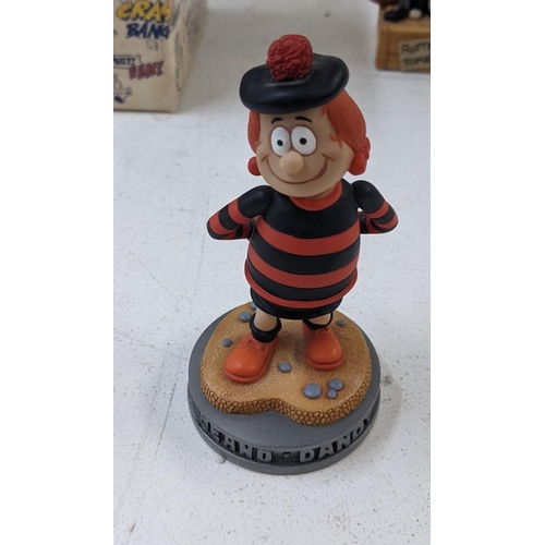 48 - A boxed Beswick Minnie the Minx Figurine along with a boxed Robert Harrop Minnie the Minx 'Armed and... 