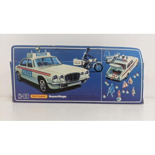 64 - Two boxed Matchbox Diecast Toys to include K-66 Jaguar XJ/12 Police Patrol and K-2001 Raider Command... 