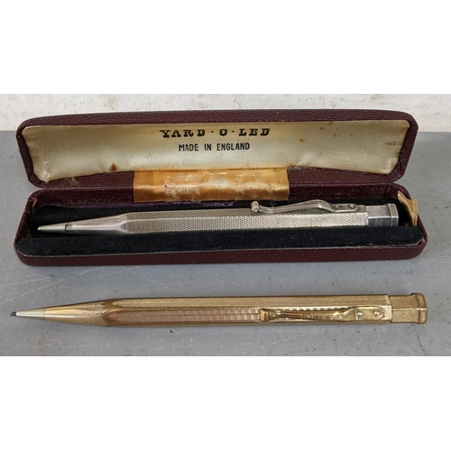 7 - Two Yard-O-Led propelling pencils to include a silver example, hallmarked London 1958, engraved Rich... 