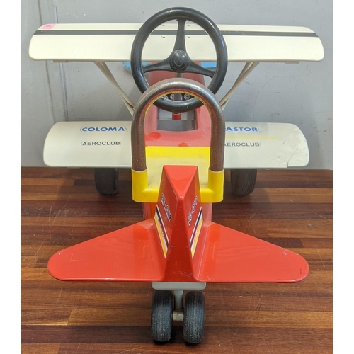 78 - A red, black, white and yellow Colma pastor ride on childs aeroplane
Location:A2B
If there is no con... 