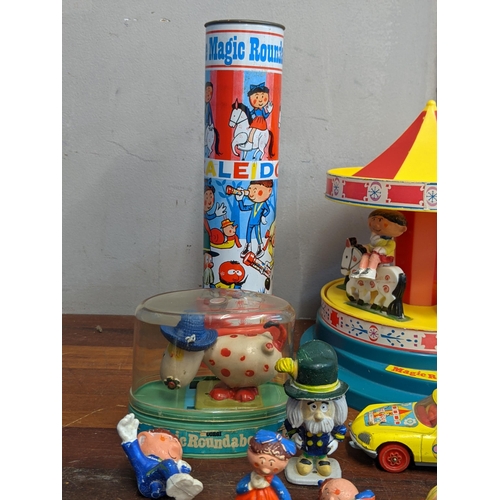 84 - Magic Roundabout and Lego related items to include a model roundabout Zebedee, Dougal, Florence and ... 