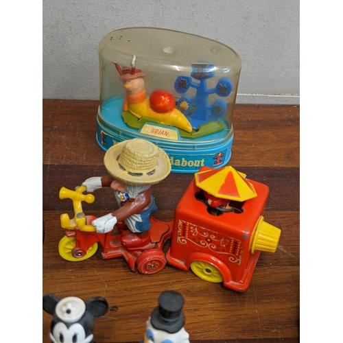 84 - Magic Roundabout and Lego related items to include a model roundabout Zebedee, Dougal, Florence and ... 