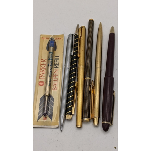 10 - Mixed pens to include a gold coloured Papermate propelling pencil, a gold coloured Parker fountain p... 