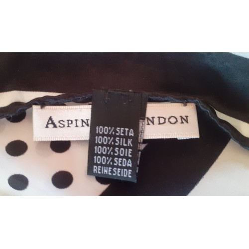 32 - Aspinal of London-A silk scarf having a design of black polka dots on a white ground with black stri... 